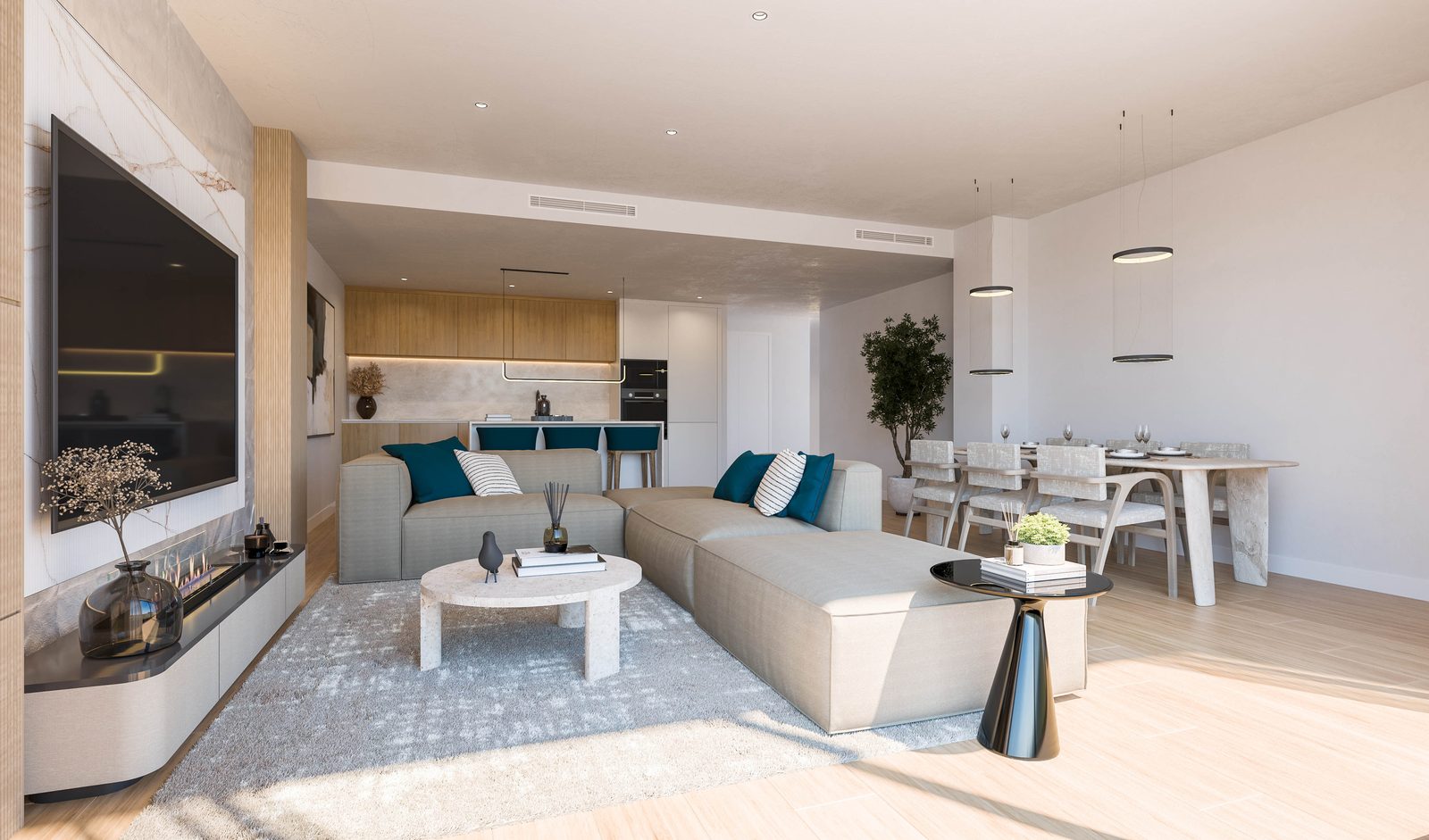 Un salón abierto a la cocina con mesa de comedor junto al ventanal