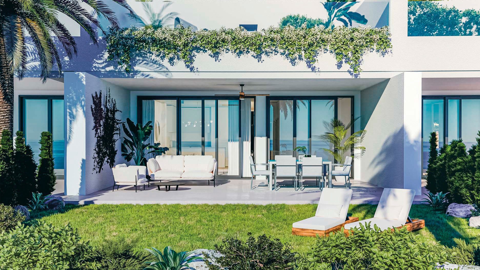 Computer-generated view of a ground-floor home with a covered terrace and a lawn with sun loungers