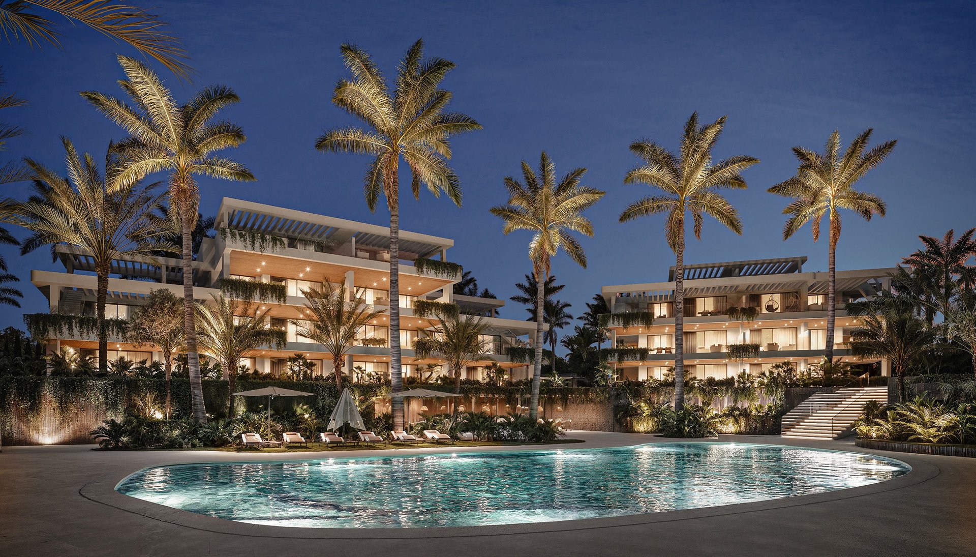 Exterior render of the development with a palm-lined communal pool at night