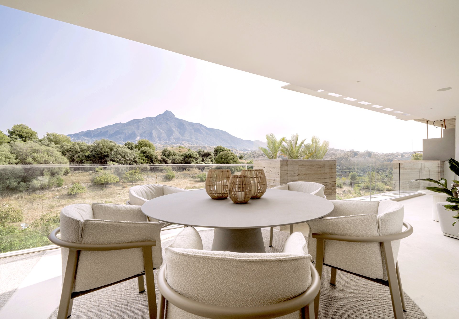 Private terrace with lounge seating and open mountain views