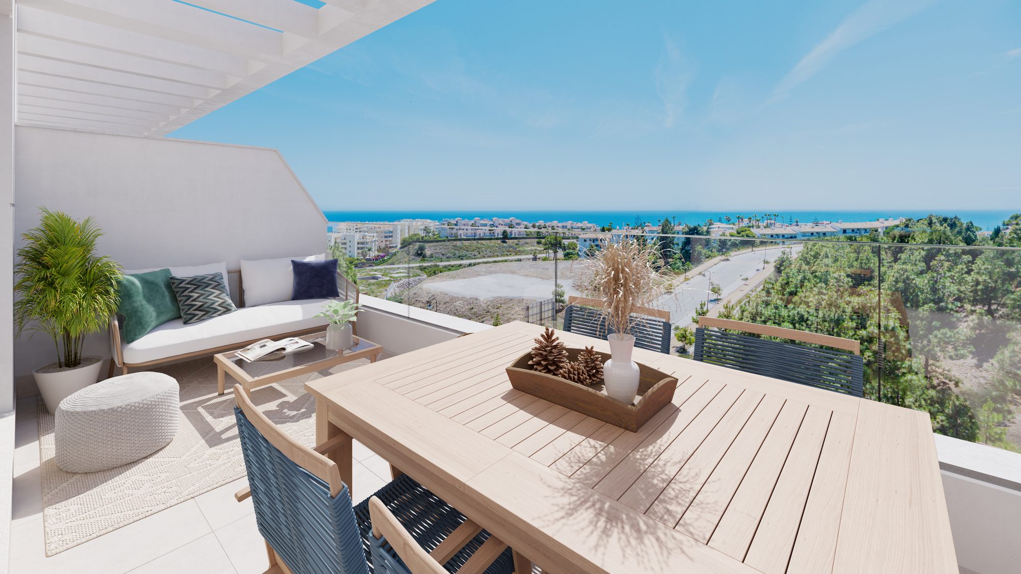 A terrace laid for dinner above the coast