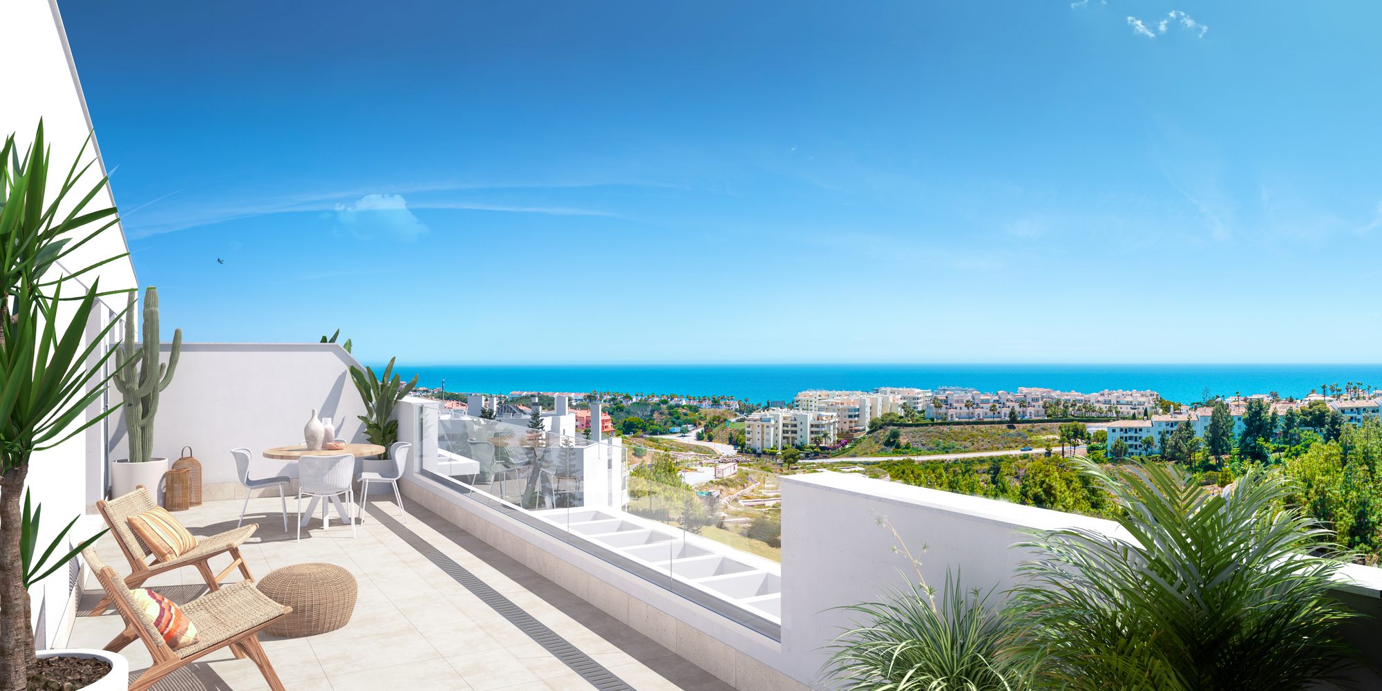 Developer visual of a terrace with a table and chairs, looking over the rooftops to the sea