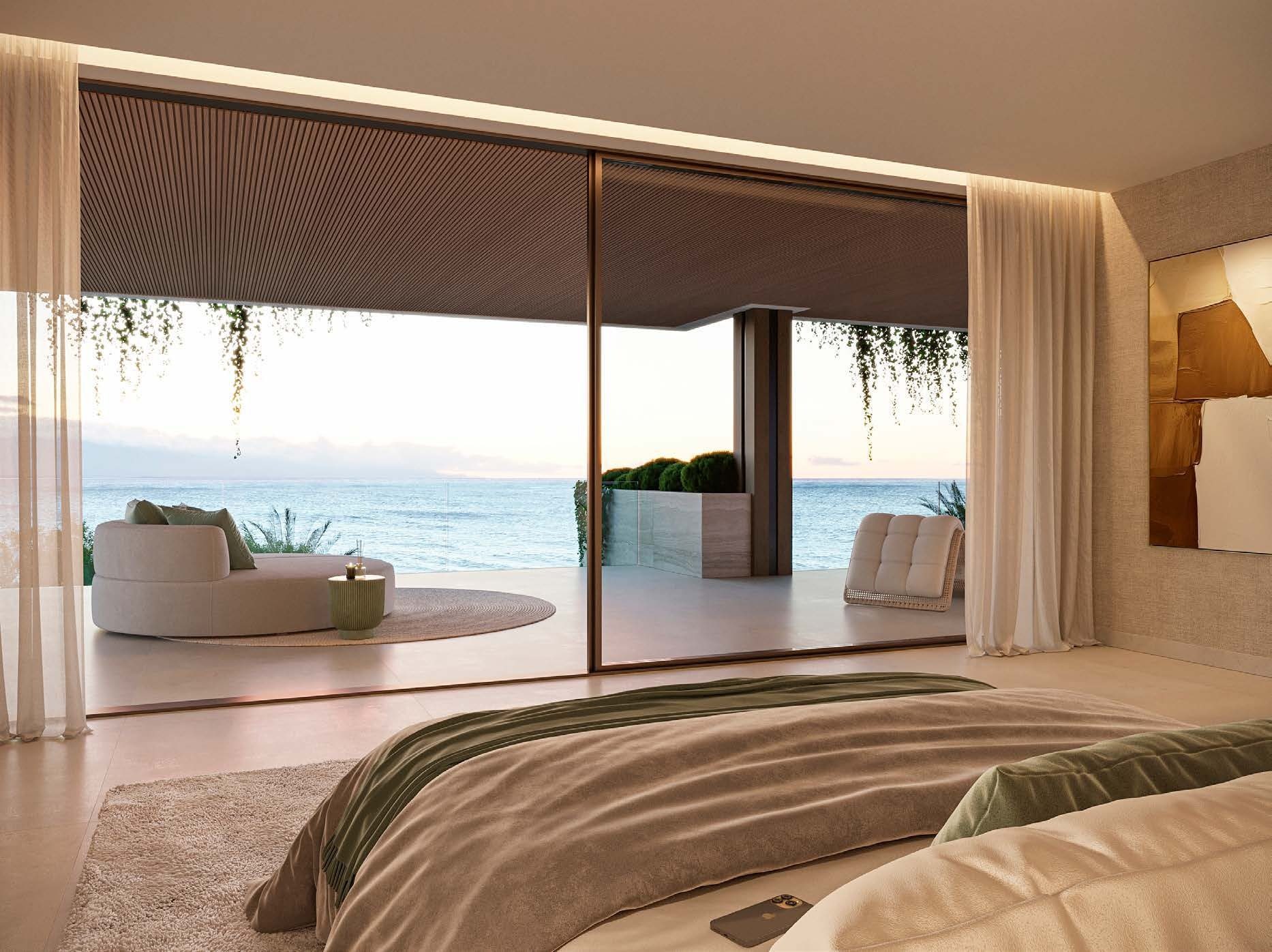 Visualisierung des Bauträgers: ein Hauptschlafzimmer mit Terrasse und dahinter dem Meer