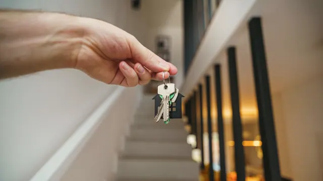 Keys ready for handover inside a completed modern home